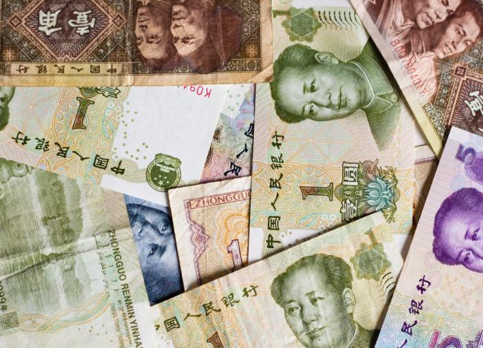Валютные инвестиции: юань или доллар  что лучше